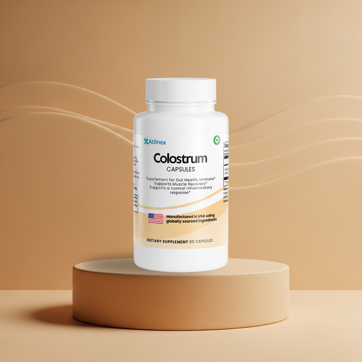 Atlinex Colostrum supplement bottle on a beige platform with a beige background