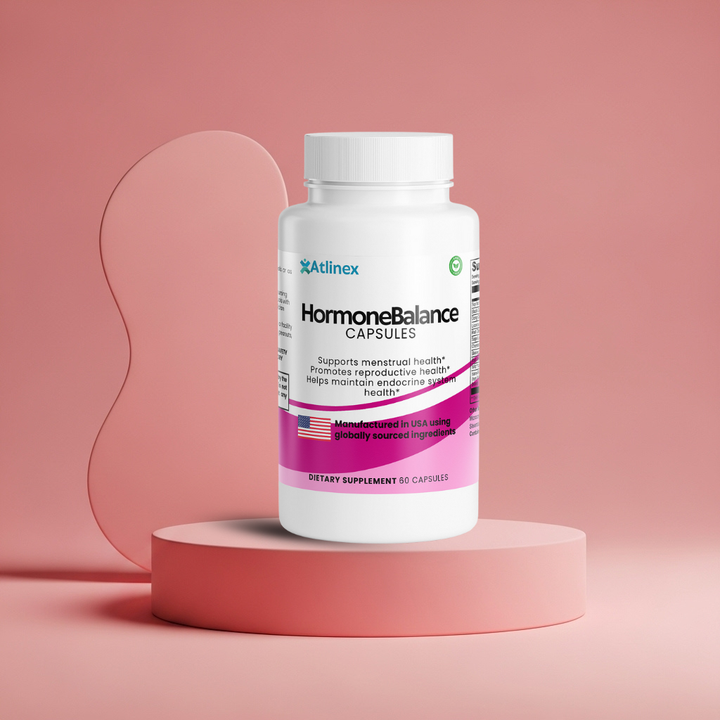 HormoneBalance capsules bottle on a pink platform with a pink background